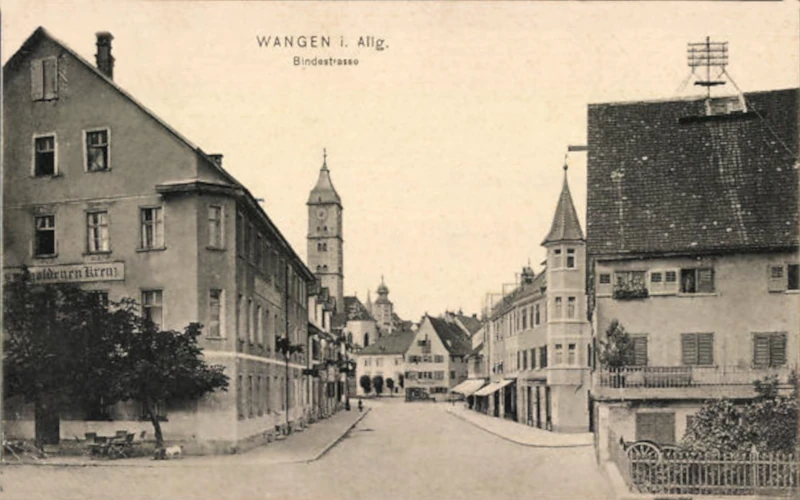Wangen_Bindstrasse_mit_Kirche_und_Gasthaus_zum_goldenen_Kreuz_1910_800
